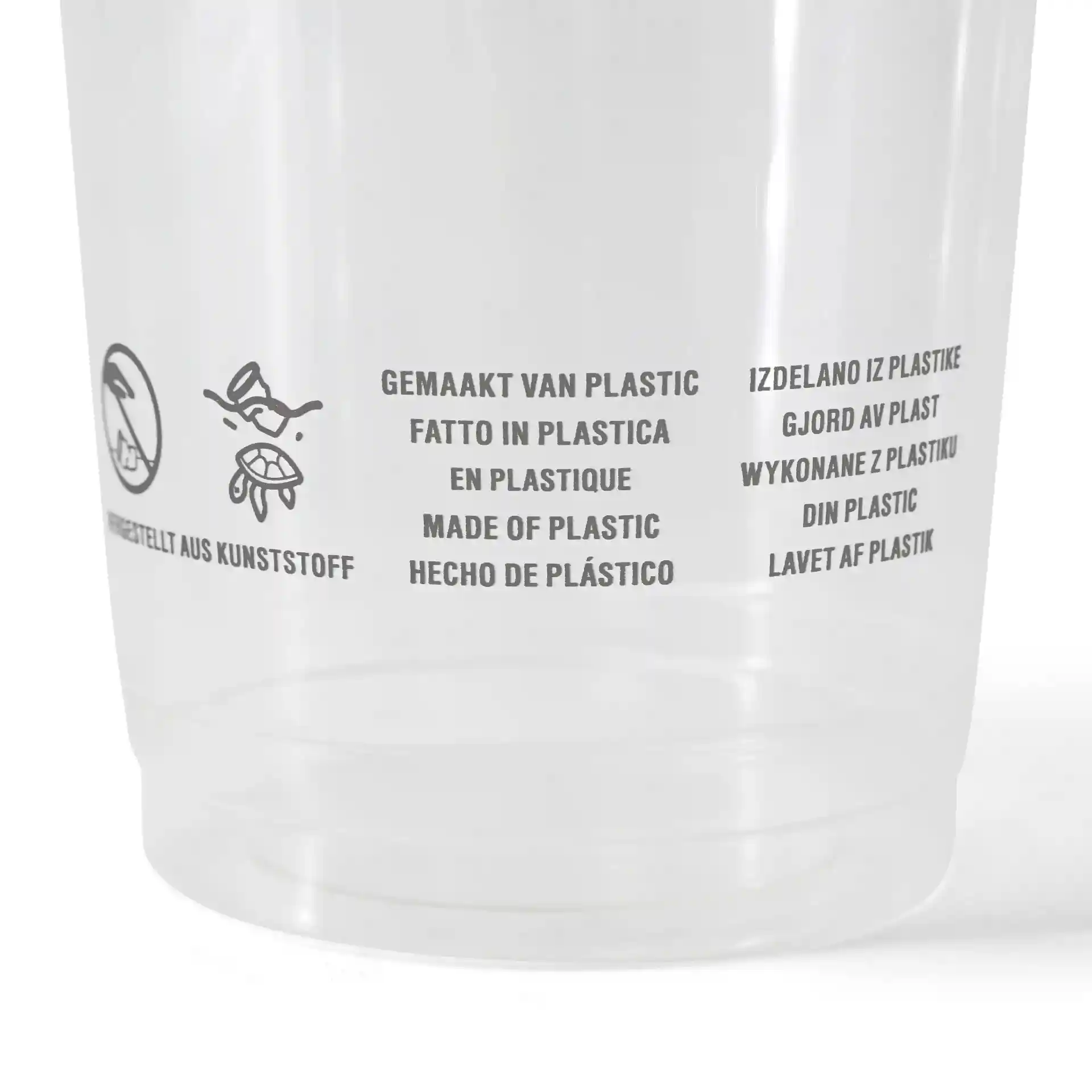 Heldere plastic beker met bedrukte meertalige tekst en symbolen, die materiaal- en gebruiksinstructies aangeven.