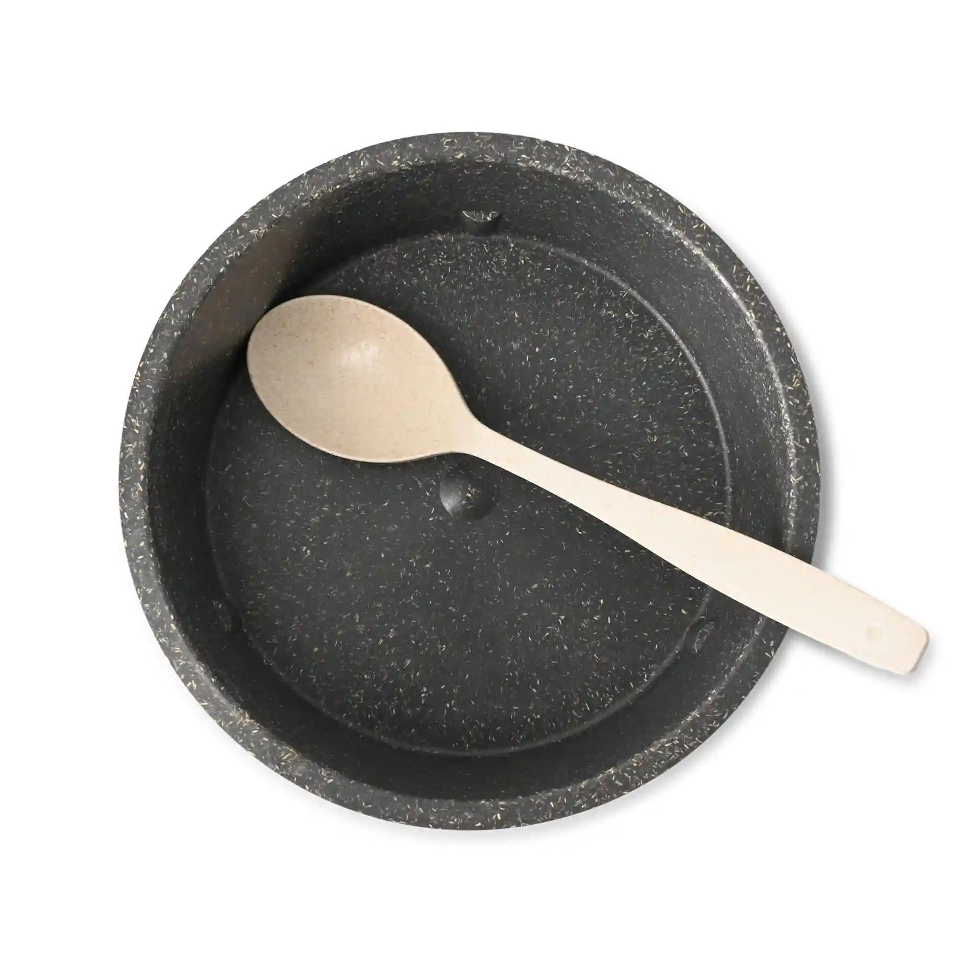 Ronde grijze herbruikbare kom met een inhoud van 650 ml en een beige lepel erin.