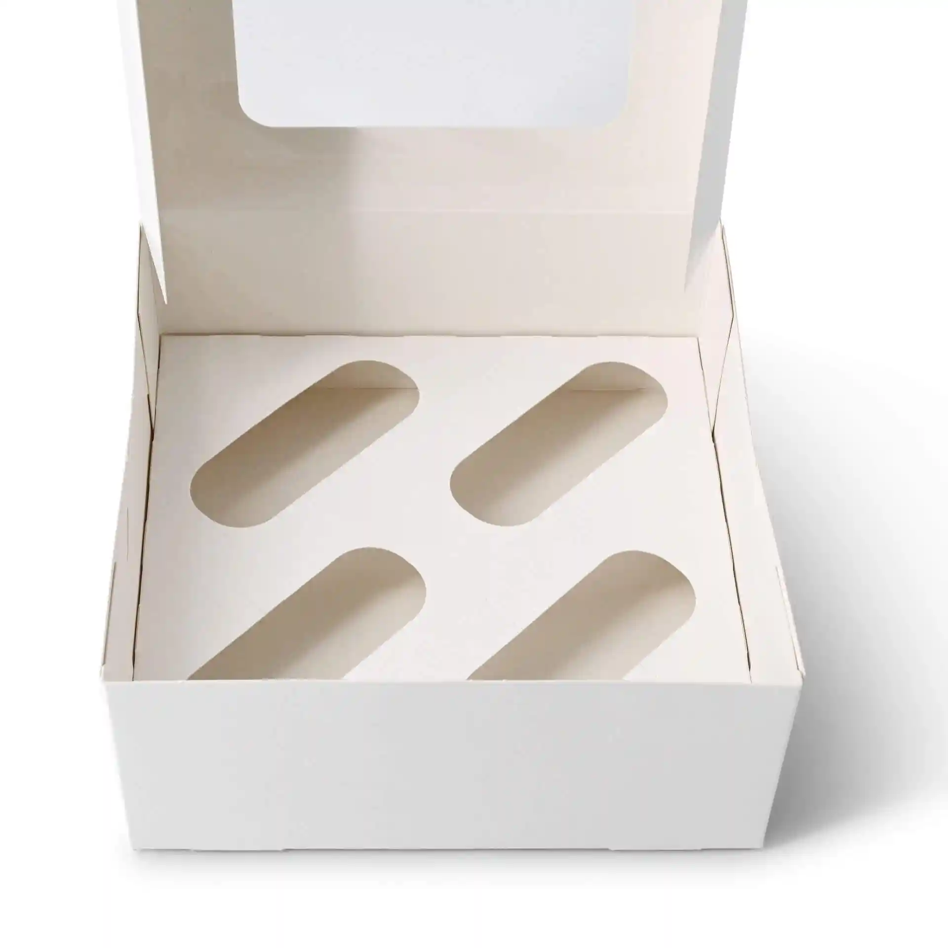 Witte kartonnen inzet voor cupcake-dozen met vier ovale uitsparingen.