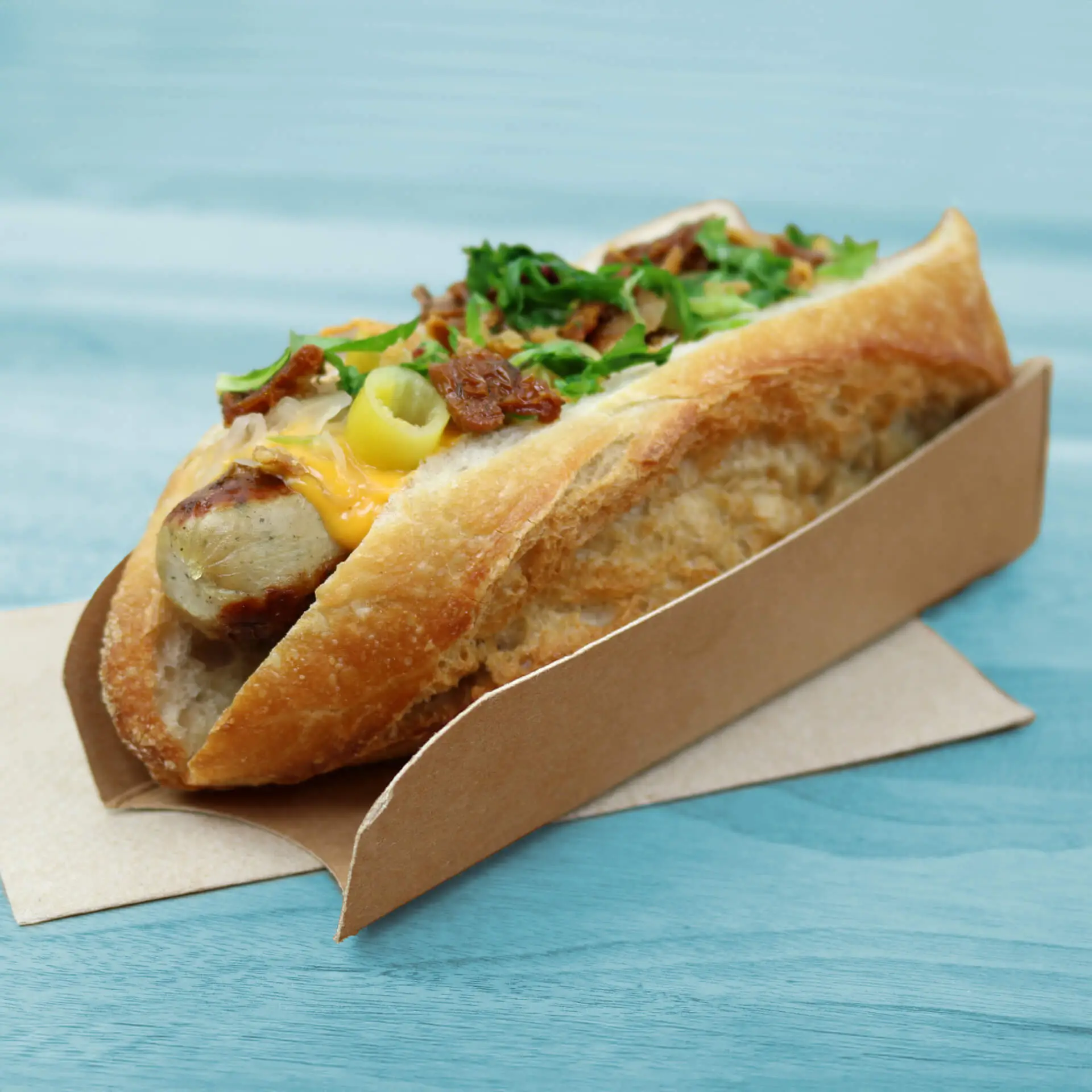 Hotdogverpakking 18 x 5 cm, bruin, opvouwbaar Hotdogverpakking 18 x 5 cm, bruin, opvouwbaar