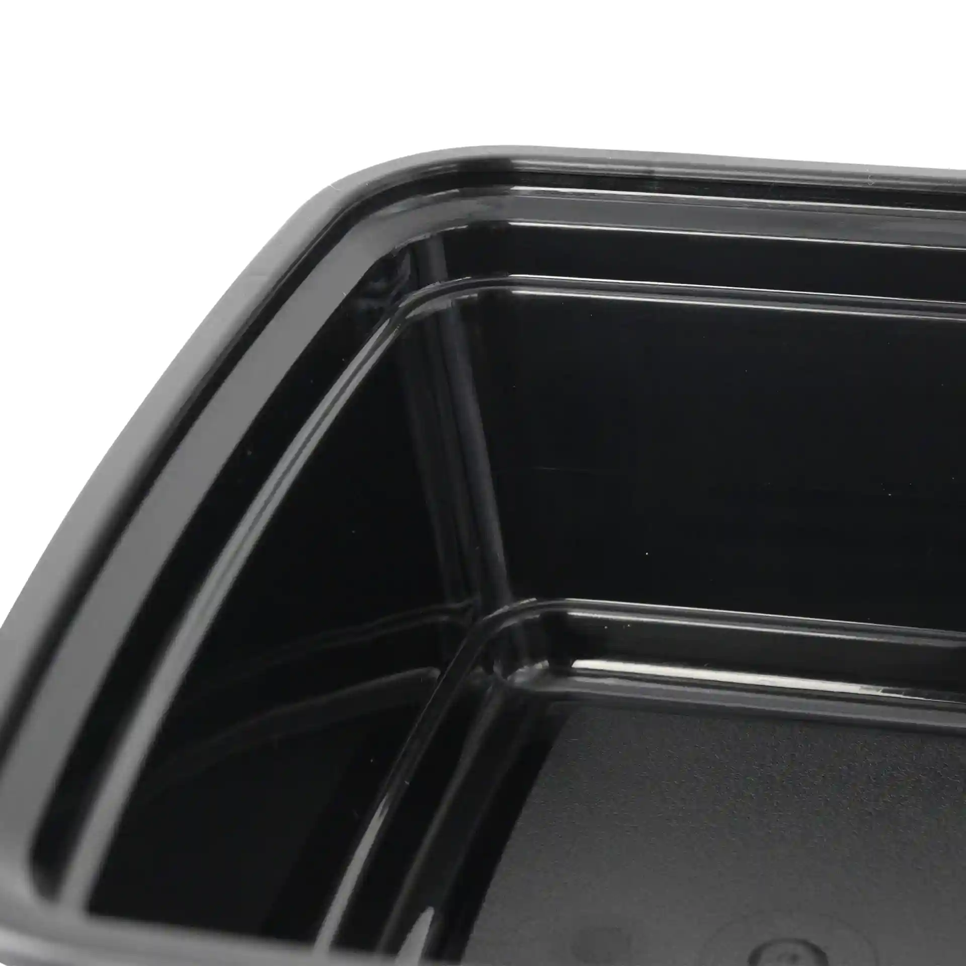 Zwarte rechthoekige herbruikbare container met een volume van 700 ml, toont het interieur en de hoeken.