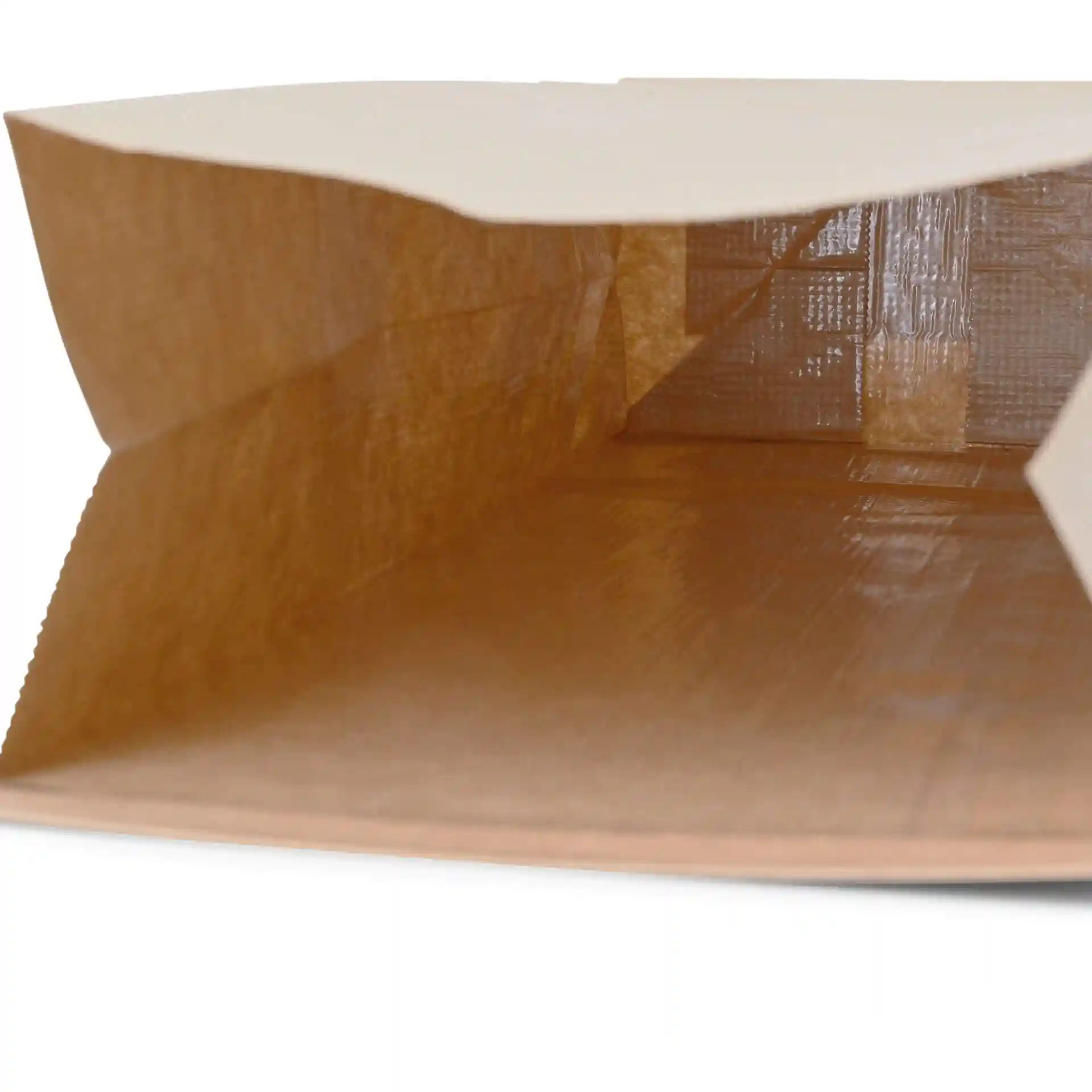 Bruine kraftpapier blokbodemzak met een open bovenkant, toont de binnenkant en de tinnen sluiting.
