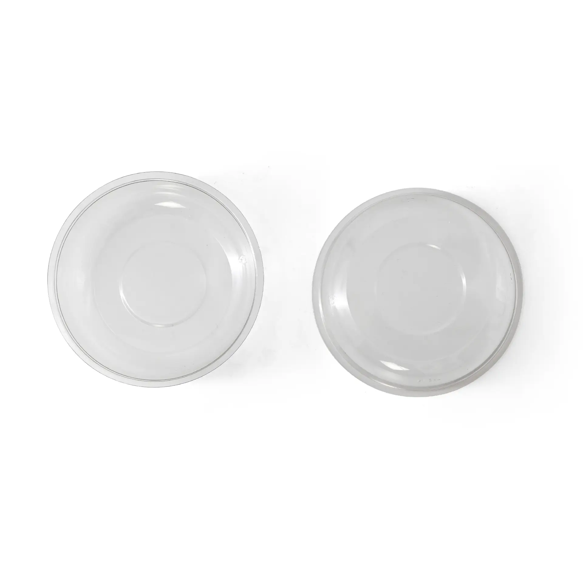 Twee heldere PET-insertbekers met een diameter van 95 mm, van bovenaf op een witte achtergrond weergegeven.